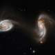Illustration for article titled The Cosmic Wonder of Colliding Galaxies